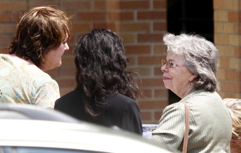 LuRae McCrery, right, grandmother of Camden Hughes, is consoled by friends after Camden’s memorial service Saturday at Calvary Baptist Church in Grand Prairie, Texas. Her daughter, Julianne McCrery of Irving, Texas, is charged in the boy’s death.