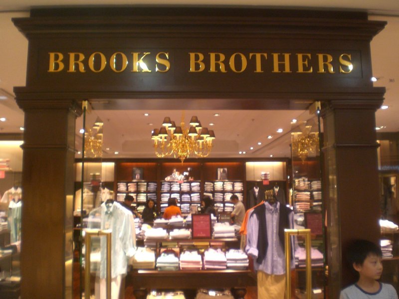 Brooks Brothers has shops all over the world, including this one in Times Square in Hong Kong, but its CEO says more and more of the company’s goods are made in the U.S.