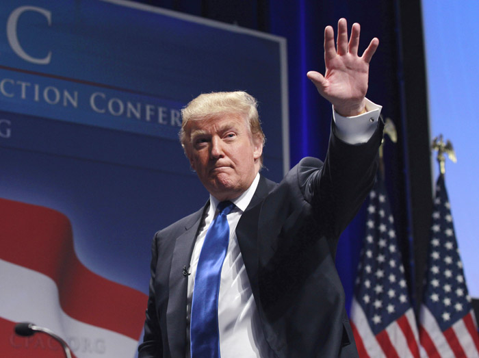 Donald Trump waves after addressing the Conservative Political Action Conference in Washington on Feb, 10, 2011.