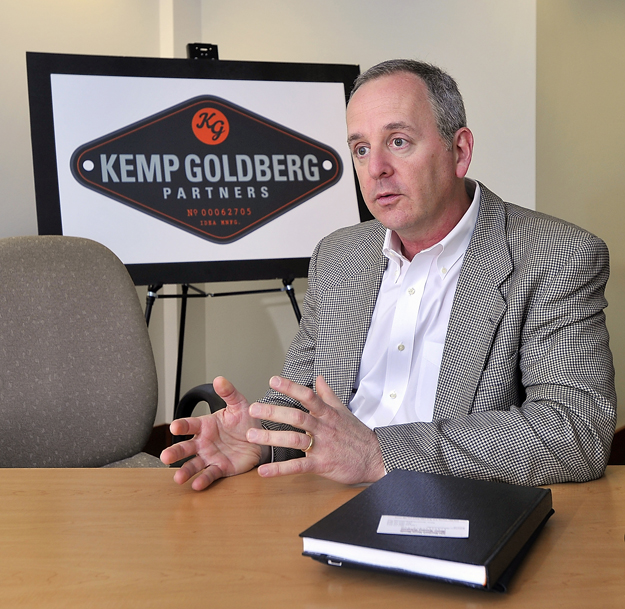 David Goldberg, founding partner of Kemp Goldberg, talks about the process of contracting with national clients and the positive effect of headquartering in Portland. The company's new logo is in the background.