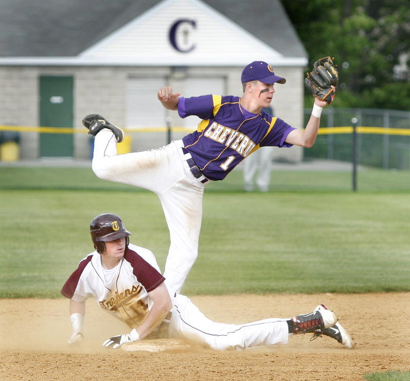 Mitchell Powers of Cheverus shows the umpire he’s still got the ball after tagging out Thornton Academy’s Jeff Gelinas. Top-ranked Cheverus advanced in the Western Class A playoffs Friday with a 5-2 victory.