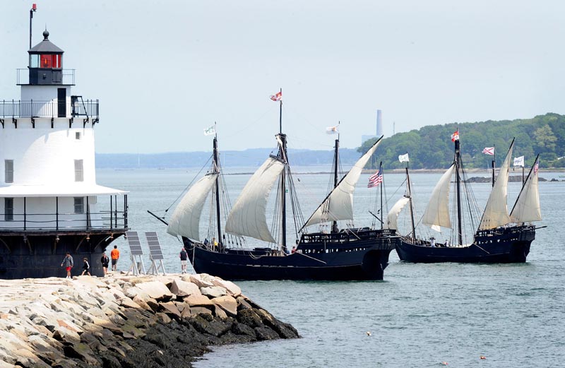 Replicas of the Pinta and the smaller Nina pass by Spring Point Light as they arrive in Portland today for a seven-day visit.