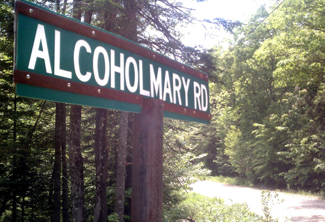 The sign for Alcohol Mary Road in Greenwood.