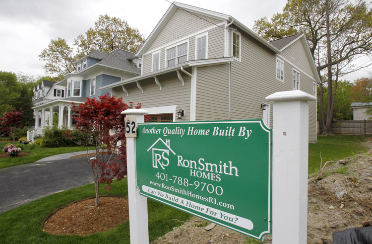 A sign advertises a newly constructed house in Providence, R.I., recently. U.S. homebuilders are concerned that the struggling housing market won't recover this year and some feel it may be getting worse.