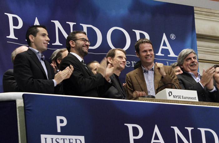 Pandora's CEO and President, Joe Kennedy, third from left, and Chief Strategy Officer & Founder Tim Westergren, fourth from left, ring the NYSE opening bell to celebrate their company's IPO at the New York Stock Exchange on Wednesday.