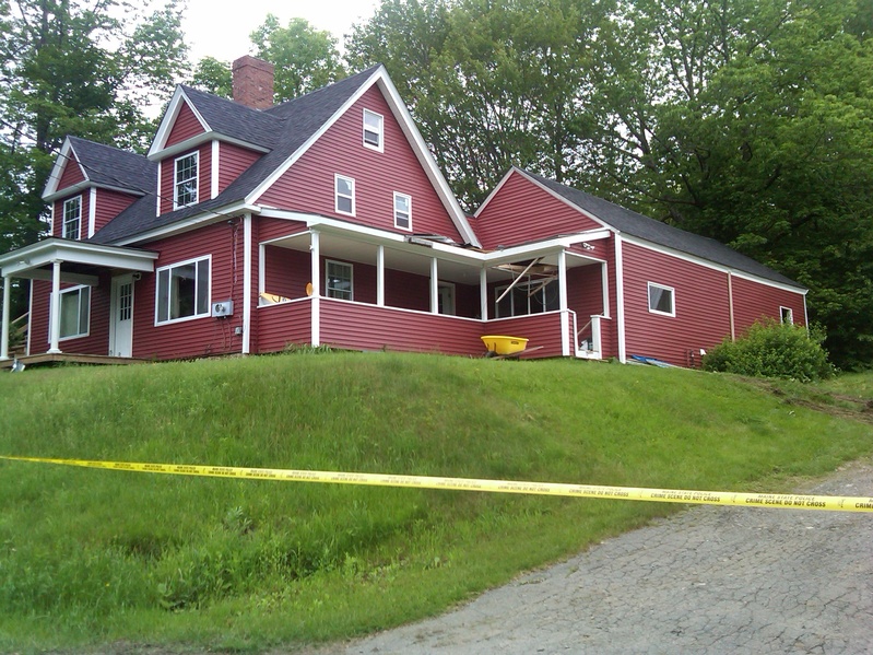 Police said they found the bodies of Steven and Amy Lake and their two children inside this home in Dexter on Monday, the apparent victims of a domestic-violence homicide.