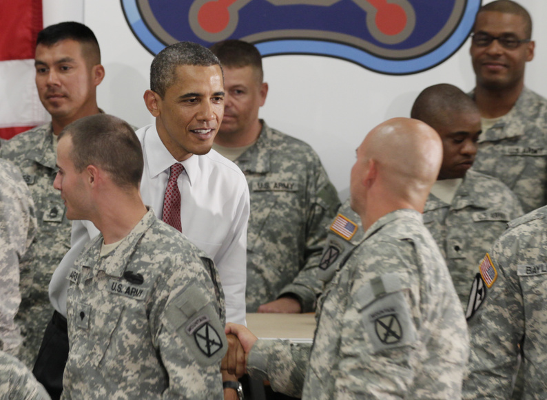 President Barack Obama visits with soldiers from the 10th Mountain Division, many of whom have just returned from Afghanistan, Thursday in Fort Drum, N.Y. On Wednesday, Obama announced the United States would begin a speedier withdrawal of troops than some of his generals would like, but not nearly fast enough for the war's growing number of critics.