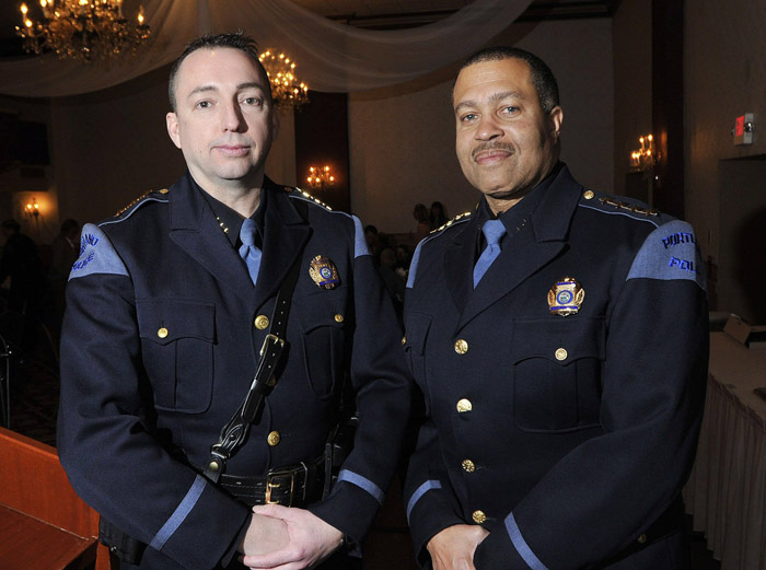In this Jan. 22, 2011, photo, Portland Assistant Police Chief Michael Sauschuck, left, and Chief James Craig attend the annual Portland Police Award Breakfast.