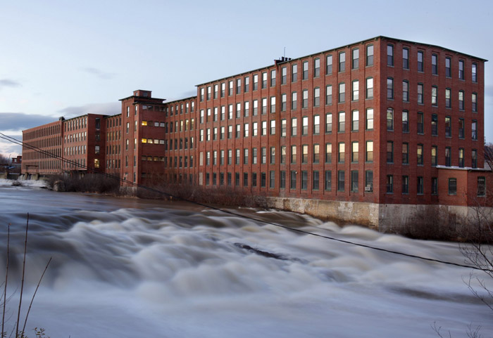 The Presumpscot River flows past the Dana Warp Mill in Westbrook on Thursday, December 3, 2009 (Gregory Rec/Staff Photographer)