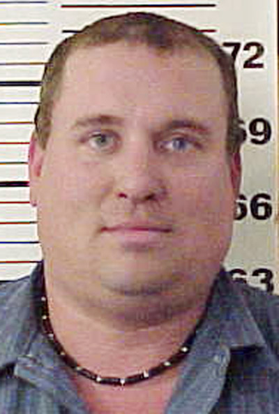 This June 15, 2010, booking photo provided by the Piscataquis County Sheriff's Office shows Steven Lake after his arrest for threatening his wife and their two children the previous day.