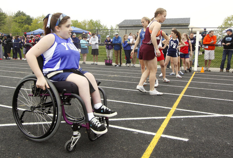 Hope Reed of York, a freshman, competed last weekend in the 100 at the Western Maine Conference meet. She is one of the three wheelchair athletes in Maine who have become part of their high school team.