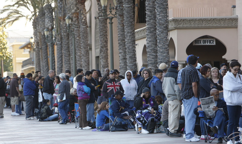Thousands of homeowners line up Thursday outside the Shrine Auditorium in Los Angeles for help with loan modifications. The Neighborhood Assistance Corporation of America has been touring several U.S. cities in the past year, offering free loan modification assistance.