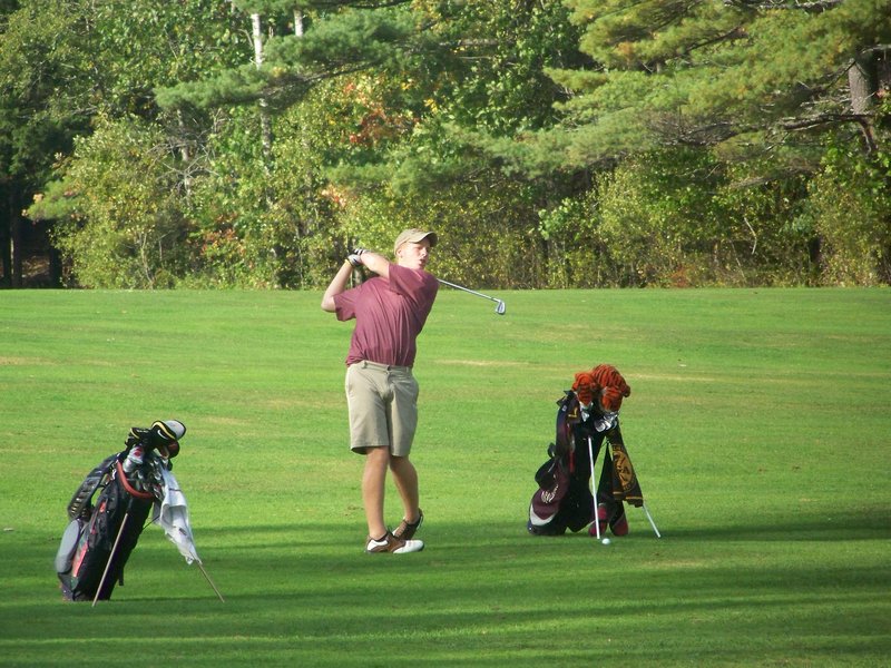 Mike Arsenault shot a 72 in harsh weather to win the individual title, then he led Gorham to the Class A team title.
