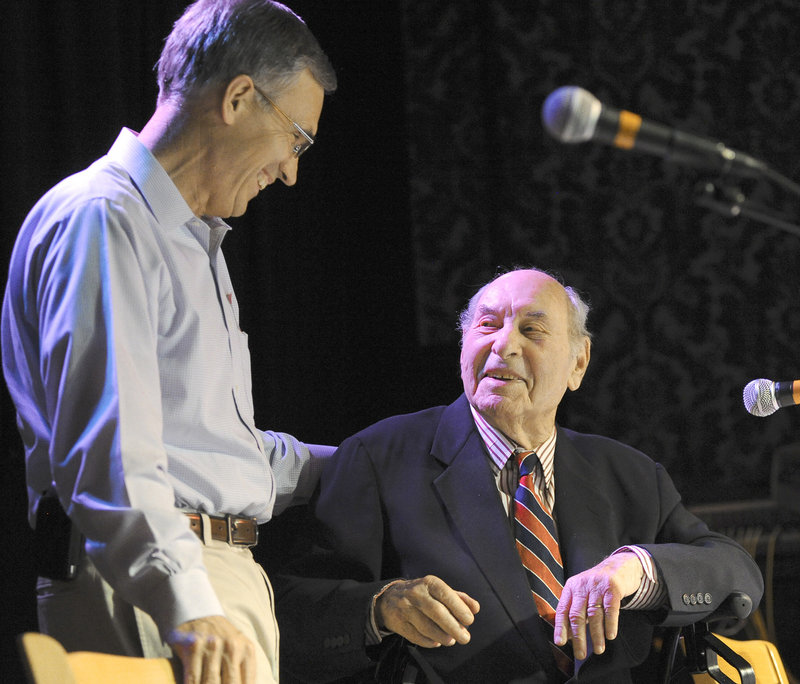 Former U.S. Rep. Tom Allen visits with guest of honor Dave Astor during "The Dave Astor Show Reunion" at Port City Music Hall in Portland on Saturday. The event applauded one of Maine s best-loved, homegrown television shows – which ran from 1956 to 1971 – as well as its genial producer.