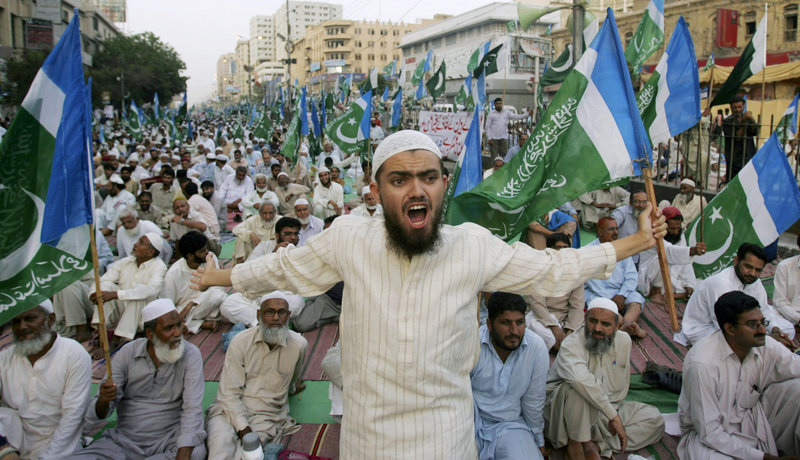A supporter of the Pakistani religious party Jamaat-e-Islami shouts during a rally against drone attacks Saturday in Karachi, Pakistan. Ilyas Kashmiri, a top al-Qaida commander and possible replacement for Osama bin Laden who was accused of the 2008 Mumbai massacre, was believed killed in an American drone-fired missile strike close to the Afghan border.