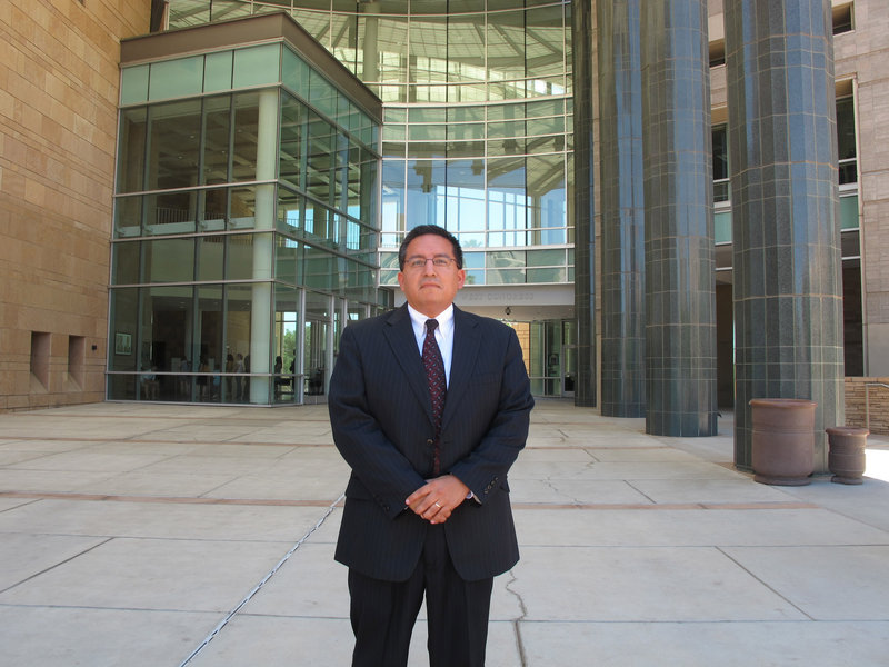 Federal defender Saul Huerta, shown outside the Evo A. DeConcini Federal Courthouse in Tucson, Ariz., has challenged Operation Streamline's legality, and calls it a separate and unequal criminal justice system.