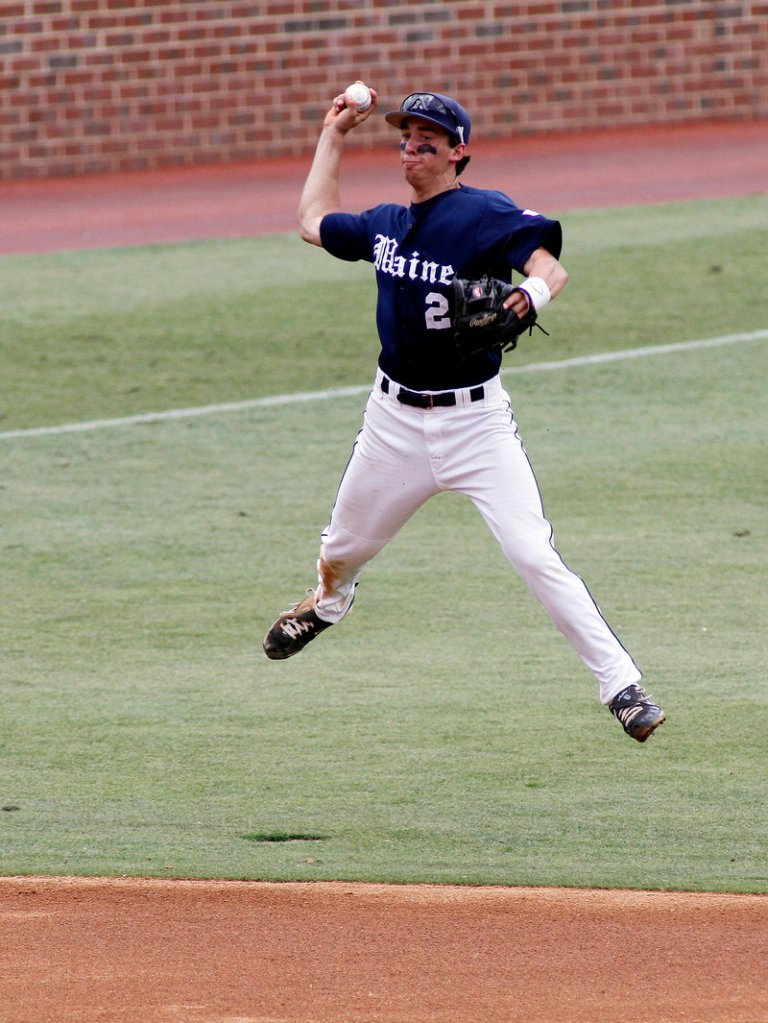 Maine’s Michael Fransoso leaps and throws during the first inning against James Madison on Sunday in the Chapel Hill Regional at Chapel Hill, N.C.