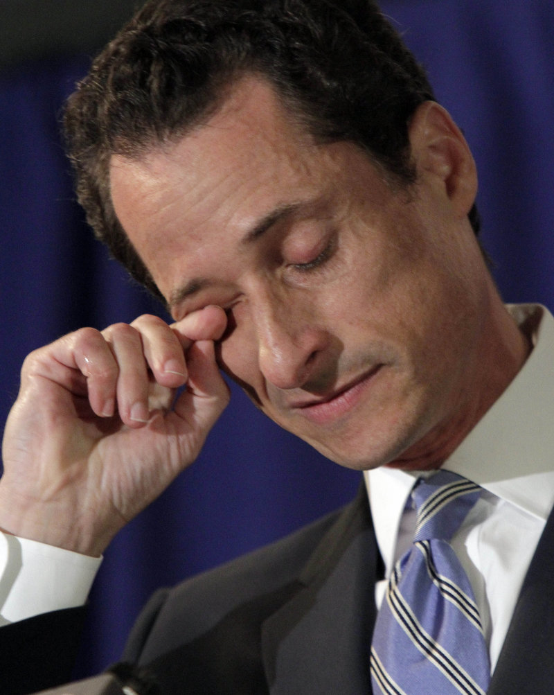 U.S. Rep. Anthony Weiner, D-N.Y., wipes his eye during a news conference Monday.