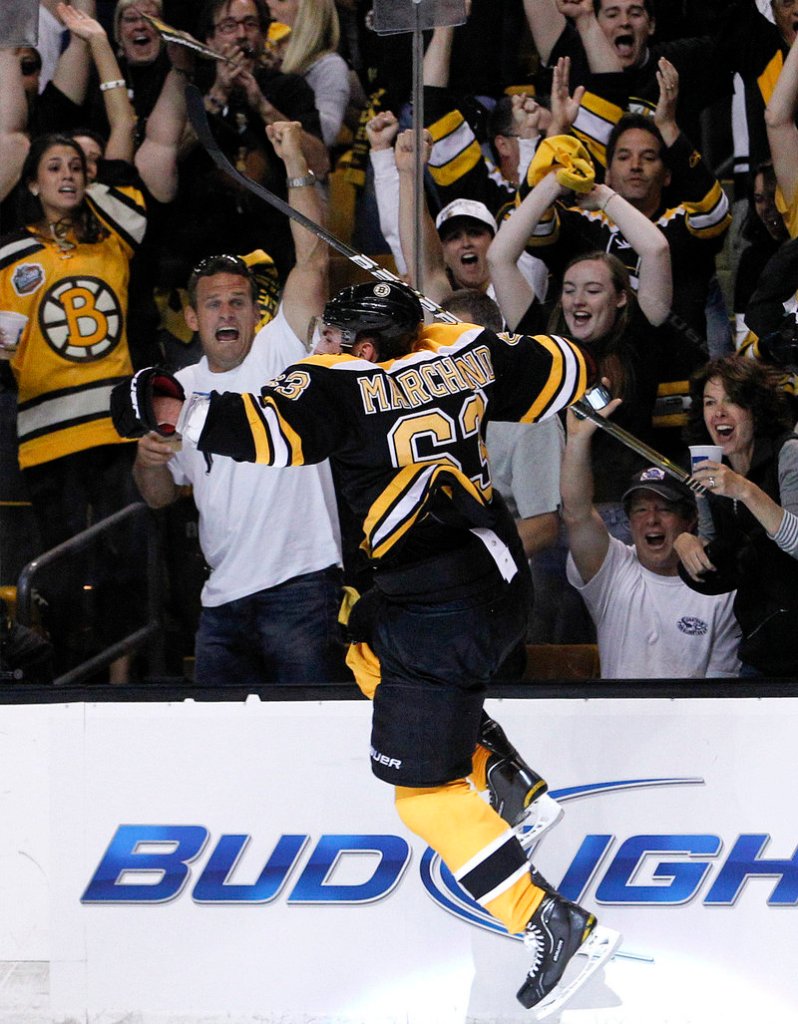 Brad Marchand reacts after scoring a short-handed goal for a 3-0 lead against Vancouver on Monday night. Boston built a 5-0 lead on the way to an 8-1 victory in Game 3 of the Stanley Cup finals. Vancouver leads, 2-1.