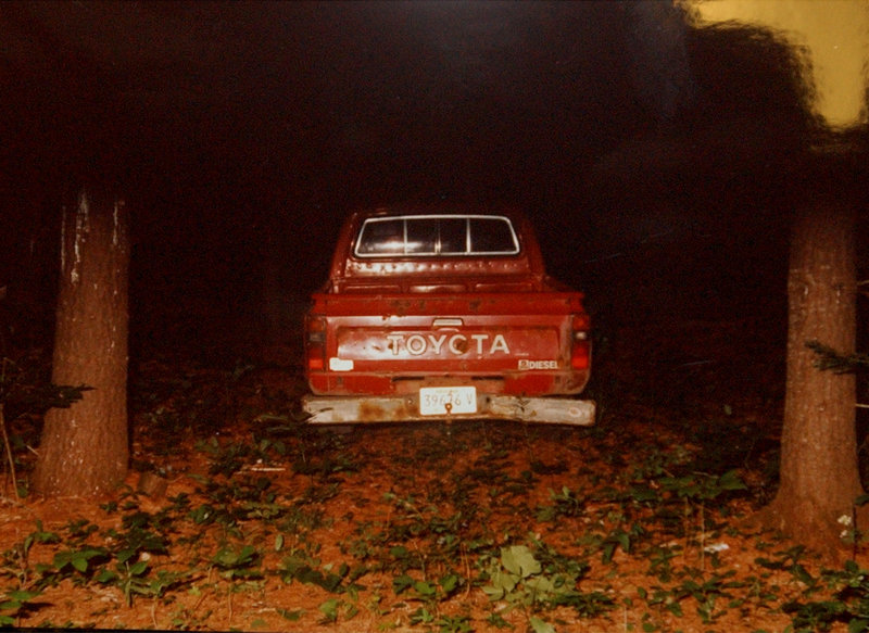 A police photo of Dennis Dechaine's pickup truck taken on July 6, 1988, the day Sarah Cherry disappeared. The truck was found near where Cherry's body was discovered.