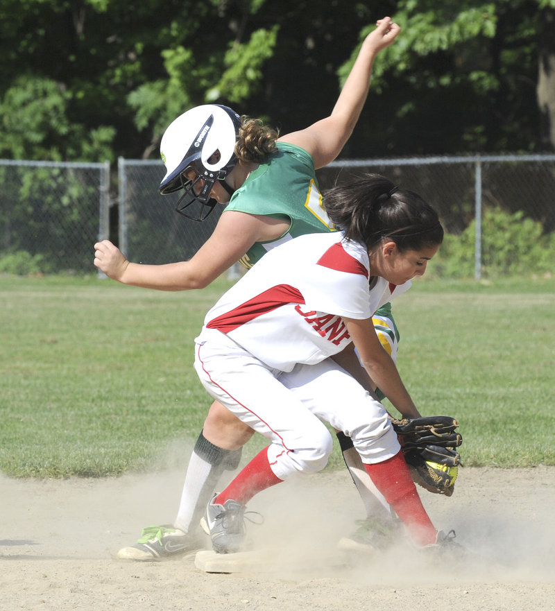 Allison Legere of Sanford snags the throw, but too late to prevent Massabesic’s Amber Libby from stealing second base Tuesday in a Western Class A softball prelim. Sanford advanced with a 3-1 victory.