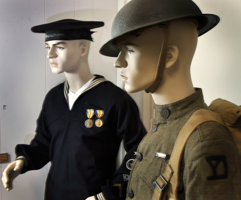 The hundreds of items on display at the new Maine Military Museum and Learning Center in South Portland include Navy and Army uniforms from World War I.