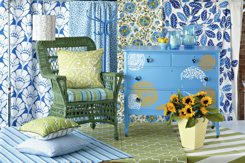 A fresh coat of paint gives a completely new look to a wicker chair, coat tree and dresser, above. Rub-on decals and pansy-shaped ceramic knobs add nifty touches to the dresser.