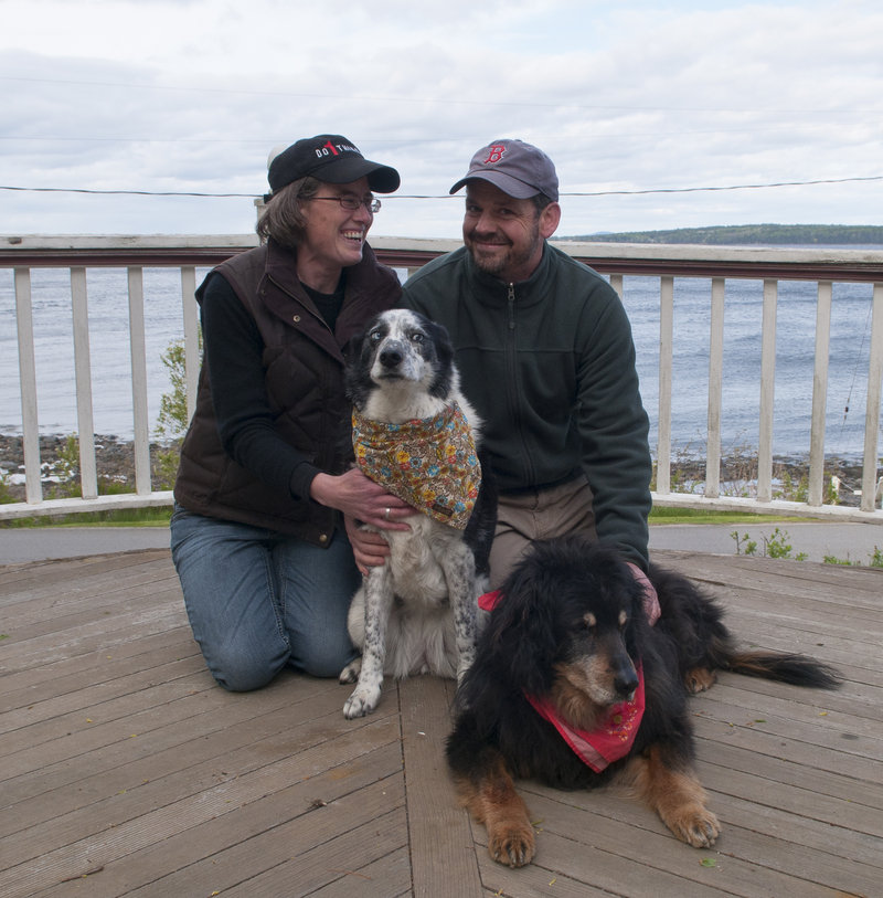 Jennifer Smith-Mayo and Matthew Mayo with their dogs, Guinness and Nessie.