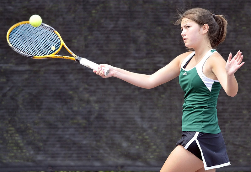 Kaitlyn Thompson of Waynflete hits a return during her No. 1 singles match against Nikki Scott of Winthrop in the Western Class C girls team tennis final Wednesday at Bates College in Lewiston. Scott won the match in three sets, but Waynflete captured the regional title with a 3-2 victory.