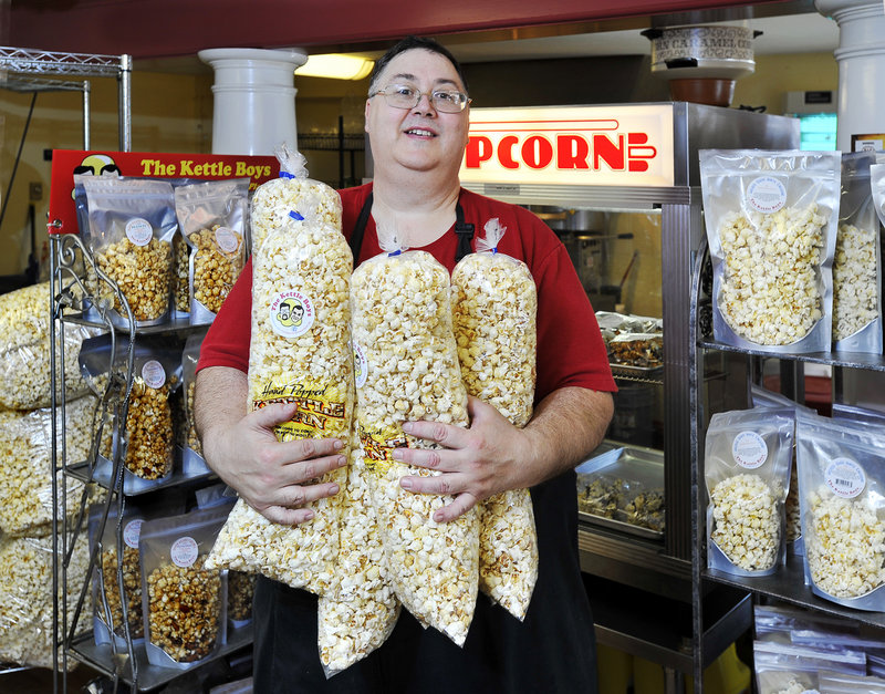 Surrounded by many of his large variety of popcorn products is Jeremy Prescott of Kettle Boys Popcorn in York Beach. The company makes about 25 different flavors of popcorn, including Cha Cha Cheddar, but kettle corn is its best-selling staple.