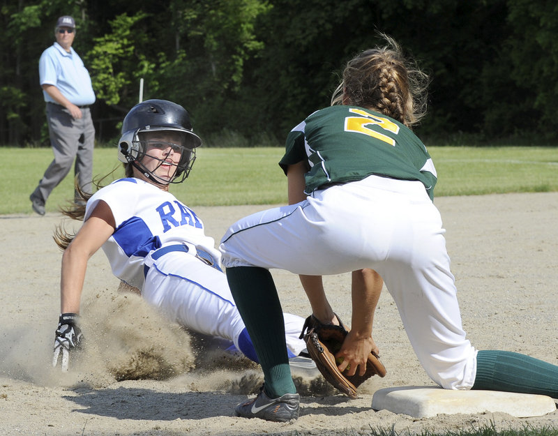 Maura Ester of McAuley blocks third base and tags out Kennebunk’s Meg Cadigan during a Class A softball quarterfinal Friday at Portland. McAuley advanced with a 7-6 victory and will face top-seeded South Portland next.