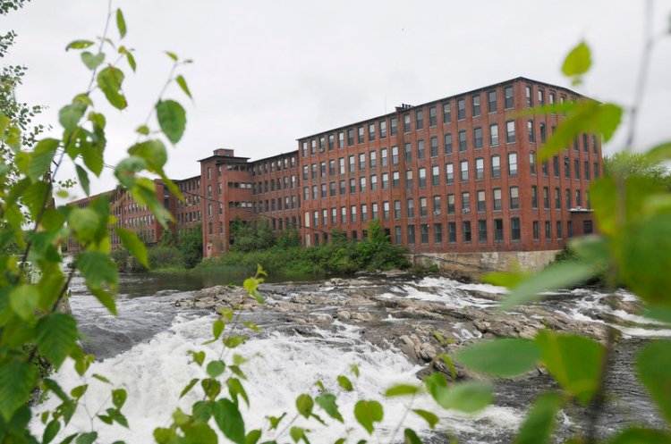 The Dana Warp Mill, overlooking the Presumpscot River in Westbrook, has been sold to a N.H. developer.