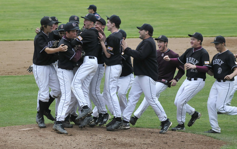 The Greely players rush the field after the final out Tuesday clinched a 7-5 victory against Yarmouth for the Western Class B baseball championship at St. Joseph's College in Standish. The Rangers will meet Waterville, the defending state champion, in the state final at 4 p.m. Saturday at St. Joseph's.