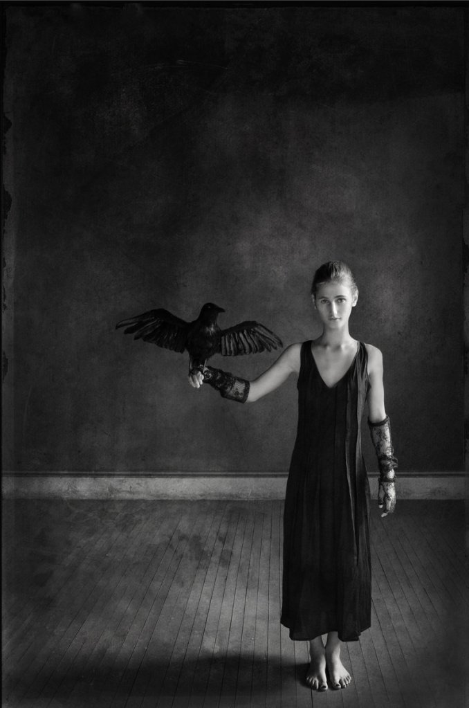 J. Felice Boucher won first place in the “Through the Lens” competition for his piece “Girl with Crow.”