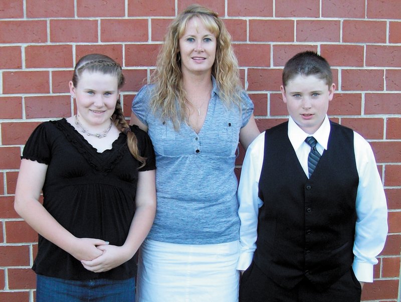 Amy Bagley Lake is shown with her two children, Monica and Coty, earlier this month.
