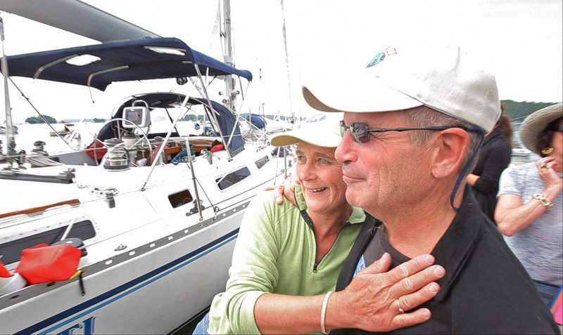 Nat and Betsy Warren-White celebrate after returning to Freeport. The round-the-world sailing trip was a lifelong dream of Nat’s.