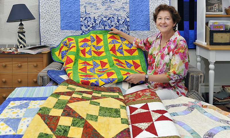 Lori Brodsky of Coast of Maine Quilters shows a selection of quilts for sale on her website. She also offers access to Quilting Studio, an Internet tool that helps clients design quilts, which are then made by professional quilters.
