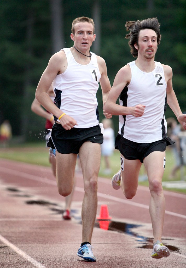 Riley Masters, left, and Dom Channon compete in the men's open mile during the Maine Distance Gala on Friday night at Bowdoin.