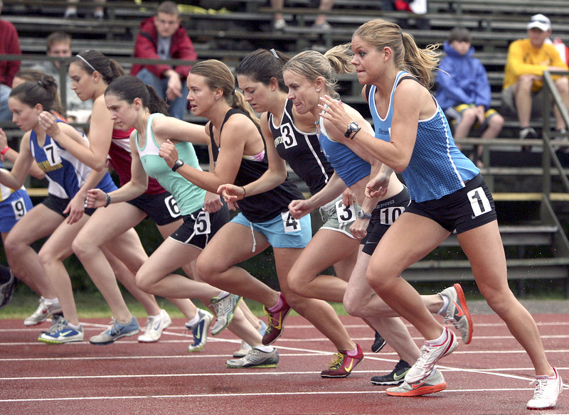 The women’s open 2 mile, high school girls’ open 2-mile and women’s open one-mile races all get under way at once Friday, featuring former Scarborough High star Erica Jesseman, far right, and Scarborough resident Kristin Barry, second from right, Friday night at the Maine Distance Gala.