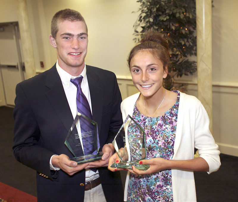 Athletes of the Year Peter Gwilym of Cheverus and Mia Rapolla of Gorham high schools display their awards in Portland on Sunday.