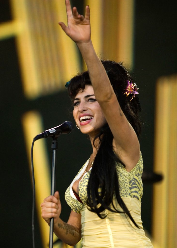 British singer Amy Winehouse performs during the Rock in Rio music festival in Arganda del Rey, on the outskirts of Madrid, on July 4, 2008. Winehouse has canceled two dates on her current tour.