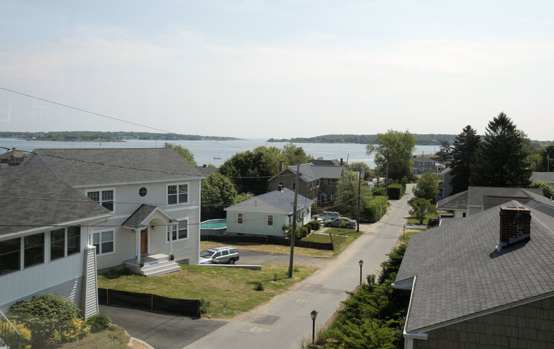 The view of Casco Bay and the Willard Beach area from an upstairs bedroom at Sharan Townsend’s home. When planning its redesign, Sokol took into consideration what might happen if other neighborhood homeowners built up.