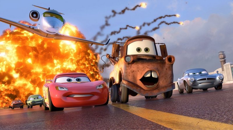 Lightning McQueen (voiced by Owen Wilson), Mater (Larry the Cable Guy) and Finn McMissile (Michael Caine) in "Cars 2."