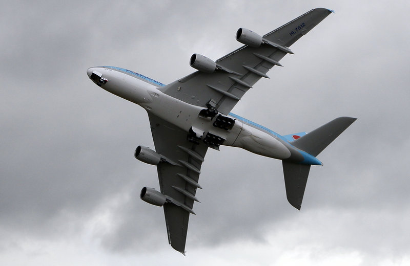A Korean Air Lines Airbus A380 banks sharply during a demonstration flight Monday at the Paris Air Show.