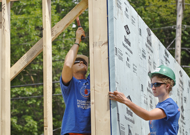 Kate Weigel of Brewer and Zach Schmidt of Pittsburgh work on a wall.