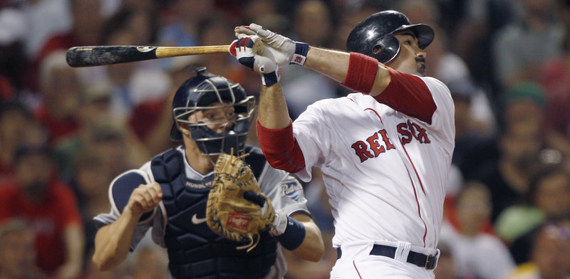 Adrian Gonzalez of the Boston Red Sox cracks an RBI double in the seventh inning Monday night, breaking a 3-3 tie and igniting a 10-run inning that helped produce a 14-5 victory against his former team, the San Diego Padres. The San Diego catcher is Nick Hundley.