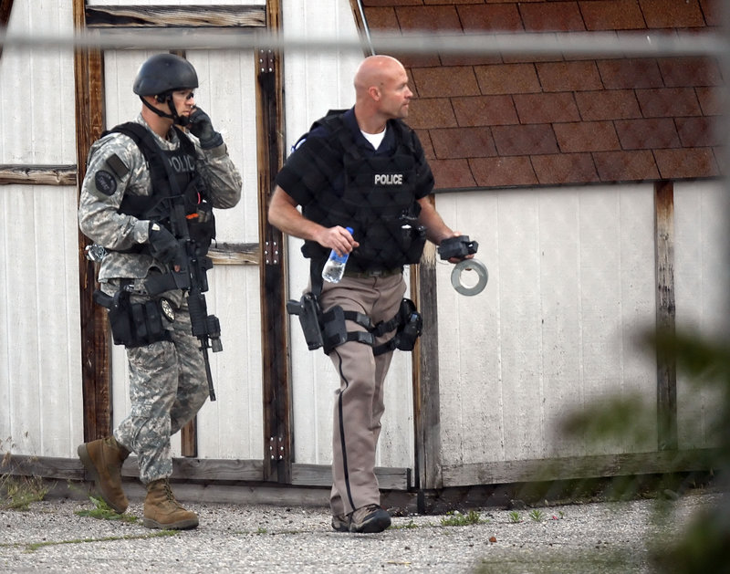 Ogden, Utah, police respond Friday to a hostage situation at the Western Colony Inn. The suspect, Jason Valdez, posted status updates on Facebook during the standoff.