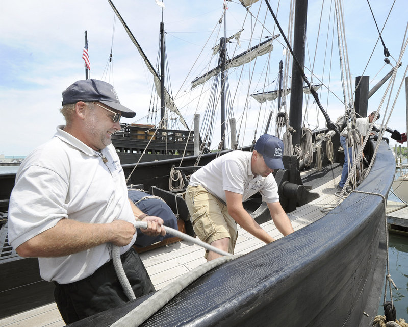 First mate Vic Bickel and crew member Alex Roberts secure the Nina to the dock at South Port Marine in South Portland, where the vessels – which travel the Americas as floating museums – will stay through Monday.