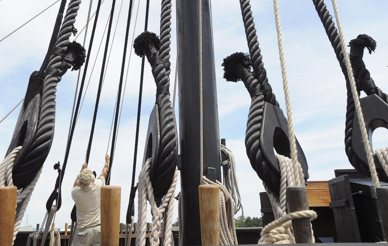 A crew member aboard the Pinta secures lines at South Port Marine in South Portland on Wednesday. At 85 feet long and 101 tons, the Pinta is slightly bigger than the original 15th-century Portuguese caravel it is meant to replicate.