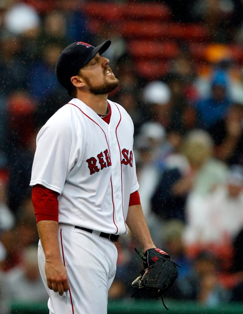 John Lackey’s contribution was a drop in the bucket Wednesday. Pitching in the rain, he lost his control in the fourth inning and watched his earned-run average balloon back to 7.36 with the 5-1 loss to the San Diego Padres at Fenway Park.